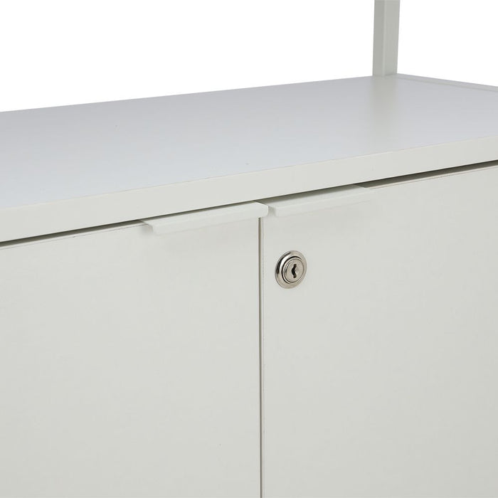 White cabinet door close-up with circular key lock on the front panel