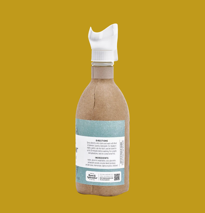 Bottle with a brown label and white cap on a white background