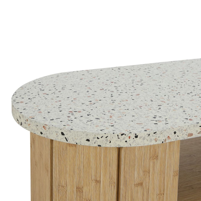 Center table top with speckled light stone surface and rounded edge