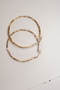 positano hoop 40mm gold by Sunny Afternoon on thegreenlabels.com