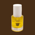 Bottle of honeybee hippie pickly pear cleansing oil on a beige background
