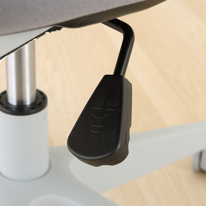 Executive chair adjustment lever and underside near the seat support, in dark plastic
